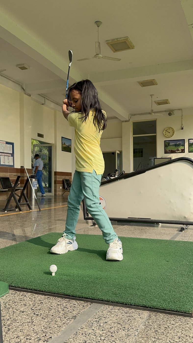 Jaisvi Kumar practising golf